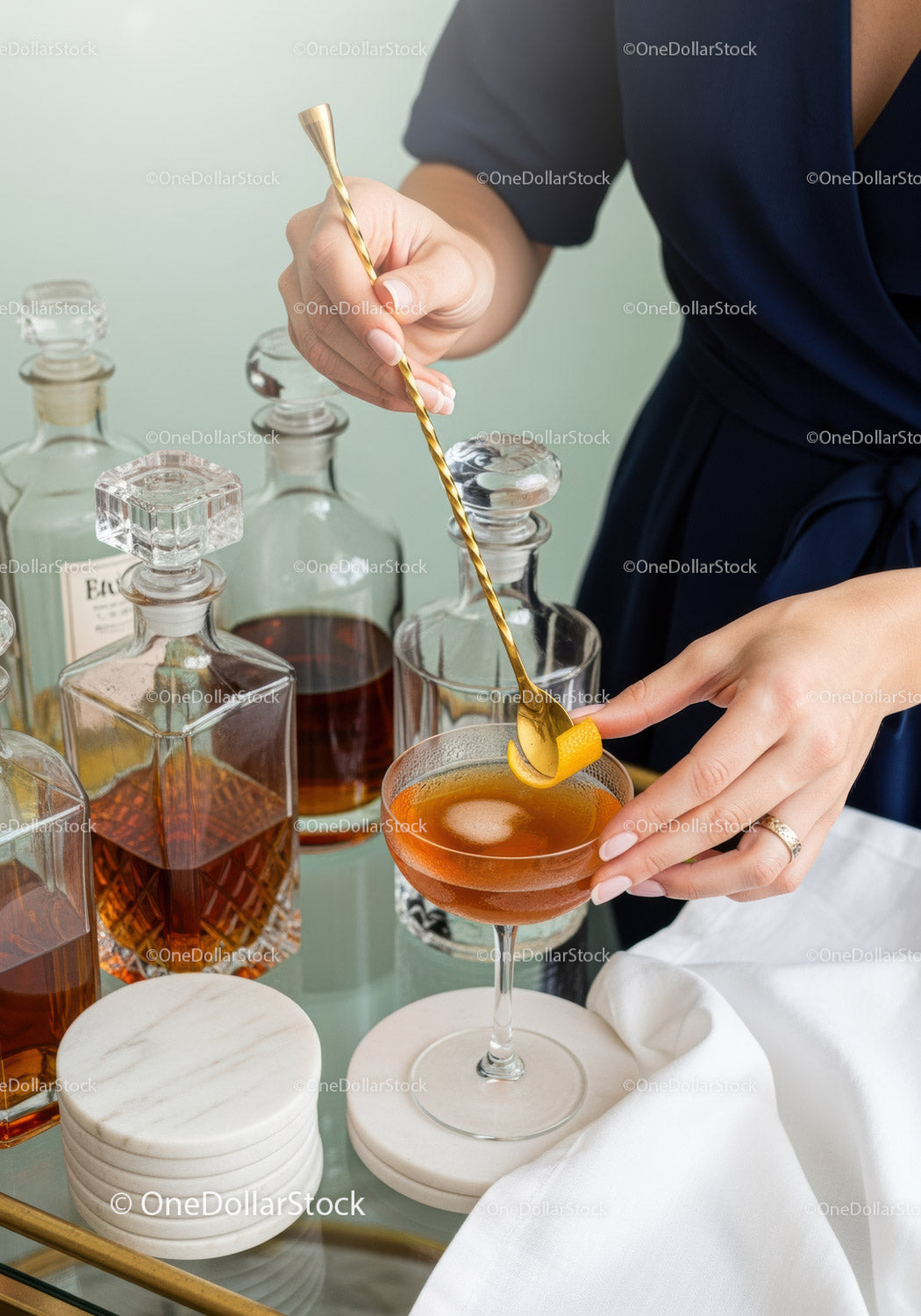Elegant Bartender Preparing Sophisticated Cocktail with Citrus Garnish