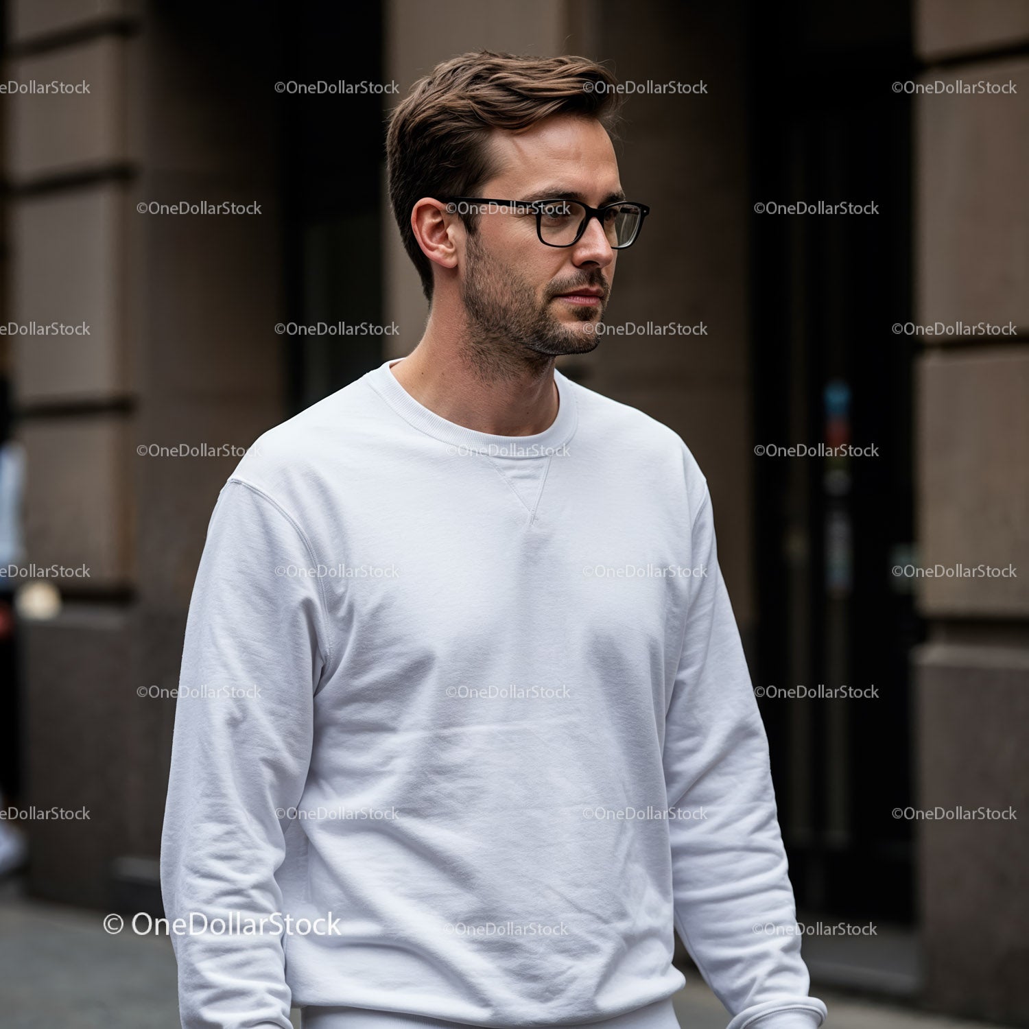Young man walking in city wearing white sweatshirt