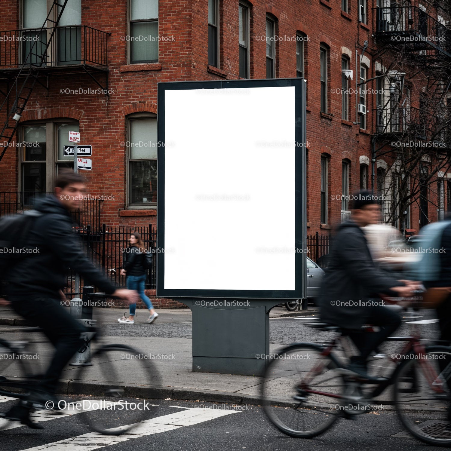 Urban street scene with blank billboard and cyclists