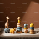 Wooden animal stacking toys in warm natural light