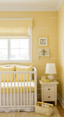 Bright Yellow Nursery with Polka Dot Bedding and Cozy Decor