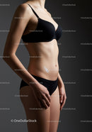 Elegant Woman in Black Lingerie Highlighting Fitness and Style