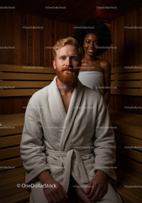 Man and Woman Relaxing in Sauna with Wooden Interior