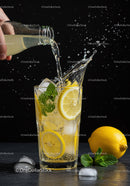 Refreshing Lemonade with Mint and Ice Splashing