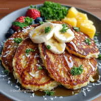 Crunchy Potato Pancakes with Banana Slices and Fresh Fruit