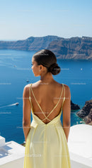 Woman in Yellow Dress Enjoying Sea View at Cliffside