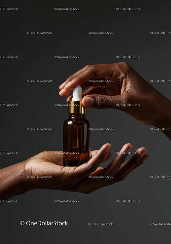 Hands Holding Amber Glass Dropper Bottle for Skincare JPG Mockup Image