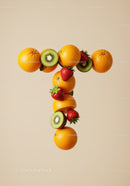 Fresh Fruits Forming Letter T on Beige Background