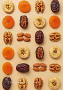 Assorted dried fruits and nuts on beige background