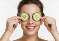 Woman with Cucumber Slices on Eyes for Natural Skincare and Relaxation