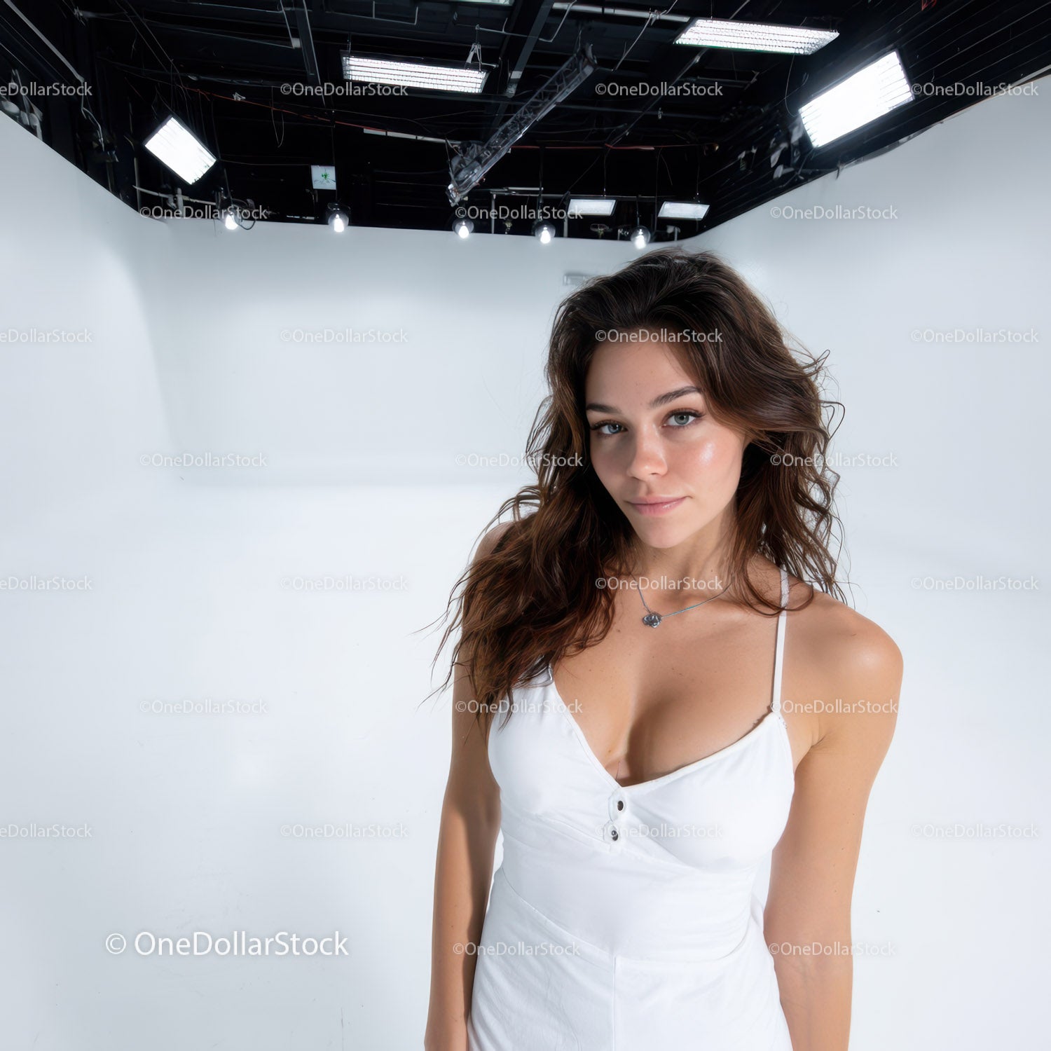 Young Woman in White Dress Standing in Modern Studio