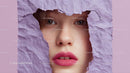 Close-Up Portrait of a Glamorous Model with Pink Lipstick