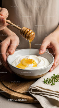 Honey Dripping into Yogurt with Fresh Herbs in a Rustic Kitchen