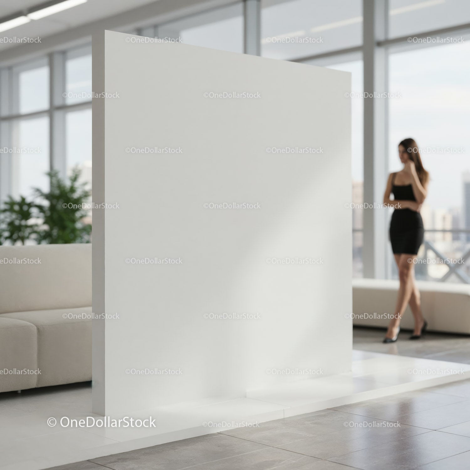 Modern office interior with blank white display panel