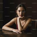 Elegant Woman with Confident Expression in Modern Indoor Setting