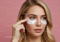 Young Woman Applying Under Eye Patches for Skincare Routine