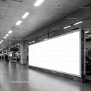 Spacious Urban Transit Hall with Large Empty Billboard