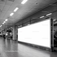 Spacious Urban Transit Hall with Large Empty Billboard