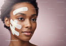 Young African Woman with Short Natural Hair Receiving Facial Treatment