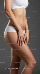 Toned Female Body with Abs in White Sportswear