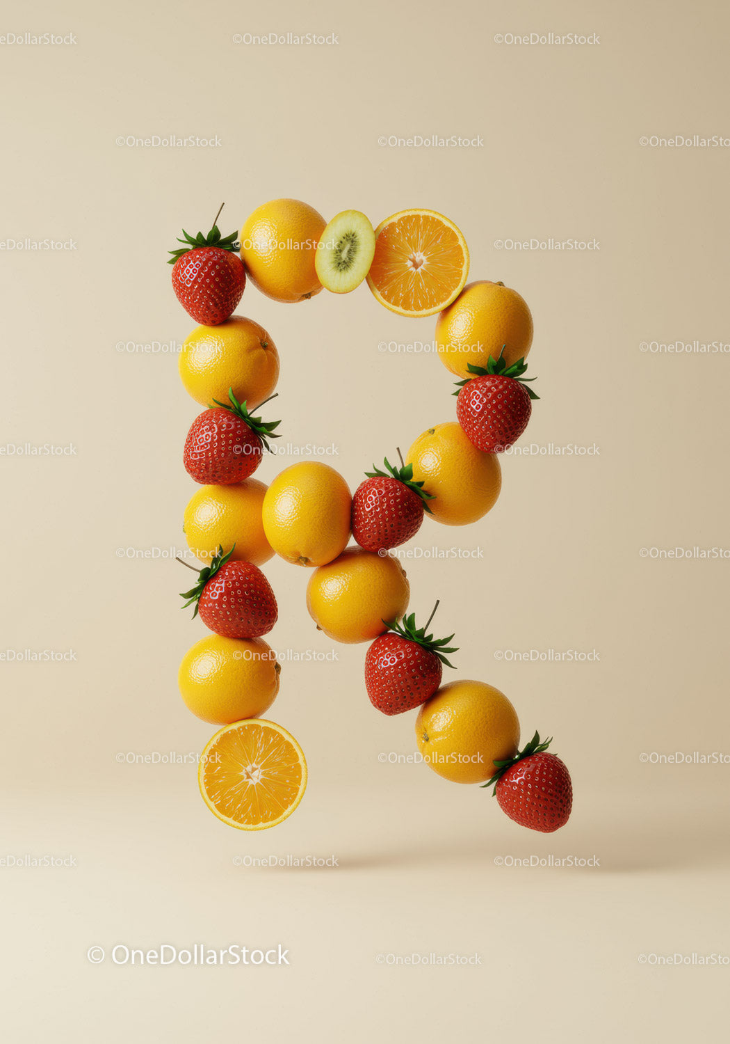 Letter R made of fresh citrus and strawberries