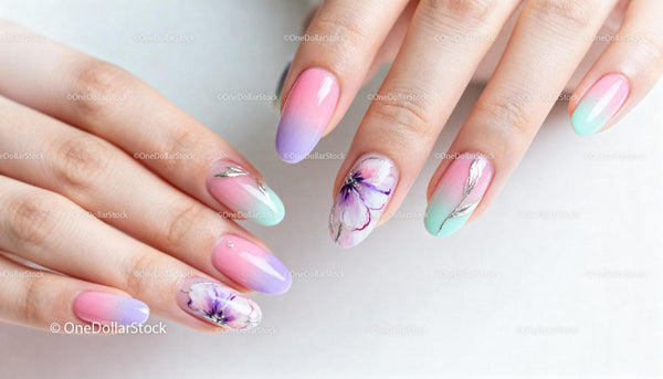 Delikatny kwiatowy i pastelowy gradientowy manicure na paznokciach