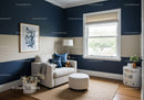 Modern Living Room with Navy Blue and Beige Walls and Cozy Decor