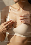 Close-up of Woman Applying Gel to Chest for Skin Care and Hydration