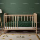 Wooden Baby Crib in Cozy Nursery with Green Wall