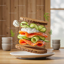 Fresh salmon and cucumber sandwich with creamy sauce