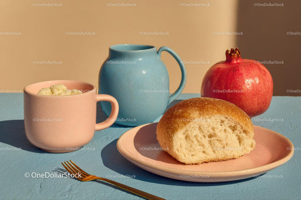 Colorful Breakfast Scene with Mug Bread and Pomegranate