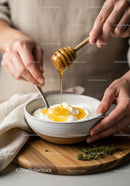 Honey Drizzling Over Yogurt With Natural Honey Dipper and Fresh Food