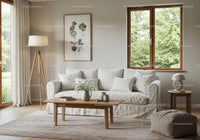 Cozy living room with white sofa and natural light