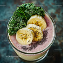 Banana Slices and Kale in Healthy Pink Smoothie with Chia Seeds