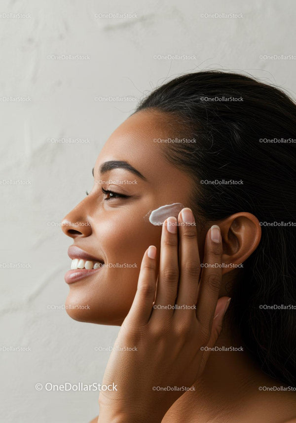 Beautiful Woman Applying Moisturizer for Glowing Skin