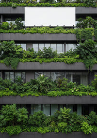 Modern building facade with lush vertical gardens