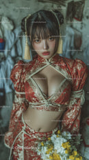 Young Woman in Traditional Red and Gold Kimono with Stylish Hair and Makeup
