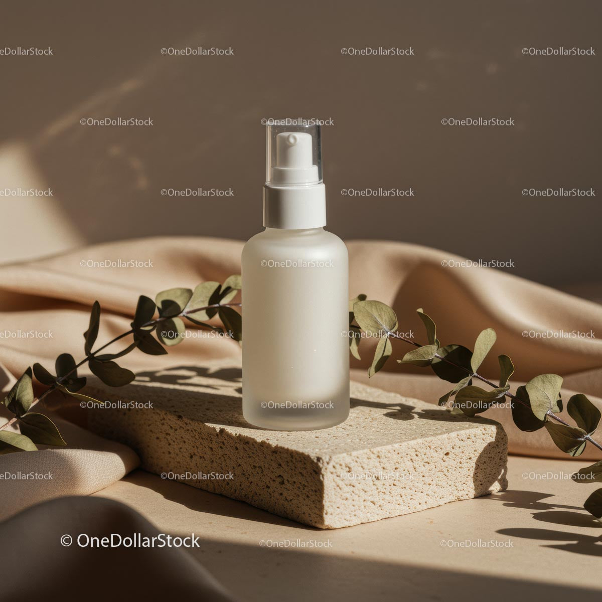 Elegant Glass Cosmetic Bottle with Eucalyptus Leaves