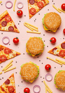 Cheeseburgers pizza slices and fries on pink background