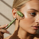 Close-up of Woman Using Jade Roller for Face Beauty and Skin Rejuvenation