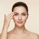 Young Woman Performing Facial Massage for Skincare Therapy