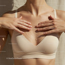 Close-up of Woman Applying Skincare on Chest with Water Drops in Sunlight