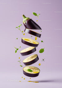 Floating sliced eggplant with herbs and olive oil drops