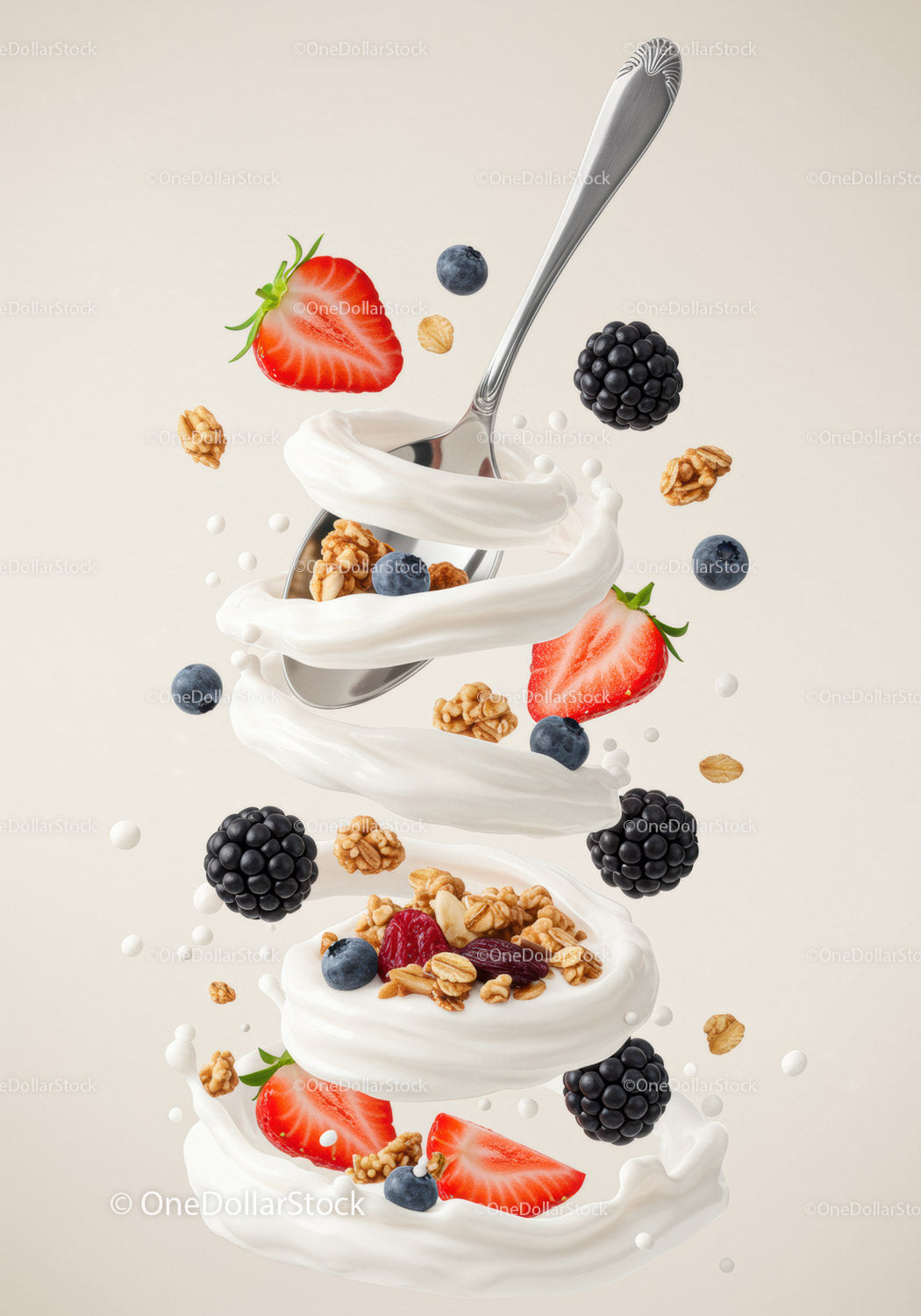 Spoon with swirling yogurt, berries and granola mix