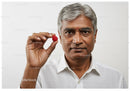 Senior Man Holding Raspberry Close-Up Portrait for Healthy Lifestyle