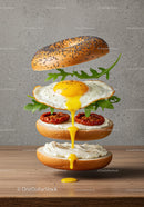 Poppy Seed Bagel with Fried Egg and Sun-Dried Tomatoes
