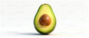 Fresh avocado half with seed on white background