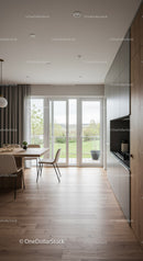 Modern dining room with large glass doors and natural light