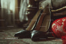 Chic Black Heels and a Red Lace Dress in a Cozy Bedroom Setting