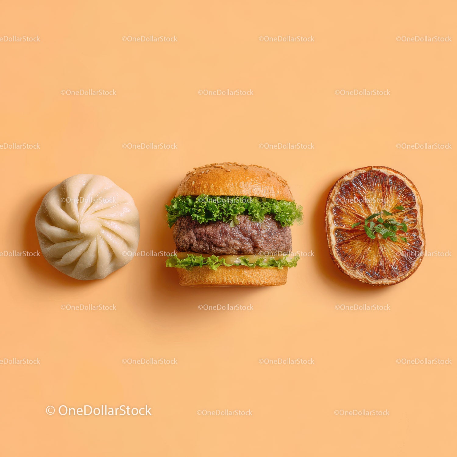 Gourmet Burger with Lettuce and Tomato Next to Grilled Steak and Dumpling